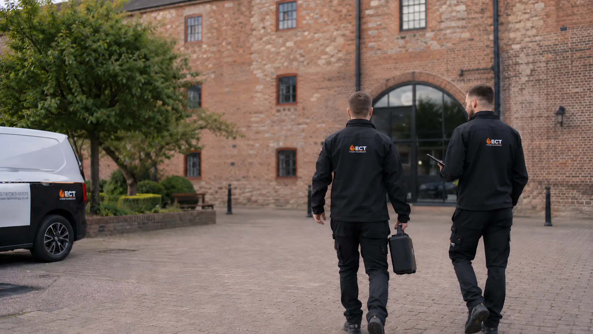 ECT fire and security engineers approaching commercial premises in Ross-on-Wye